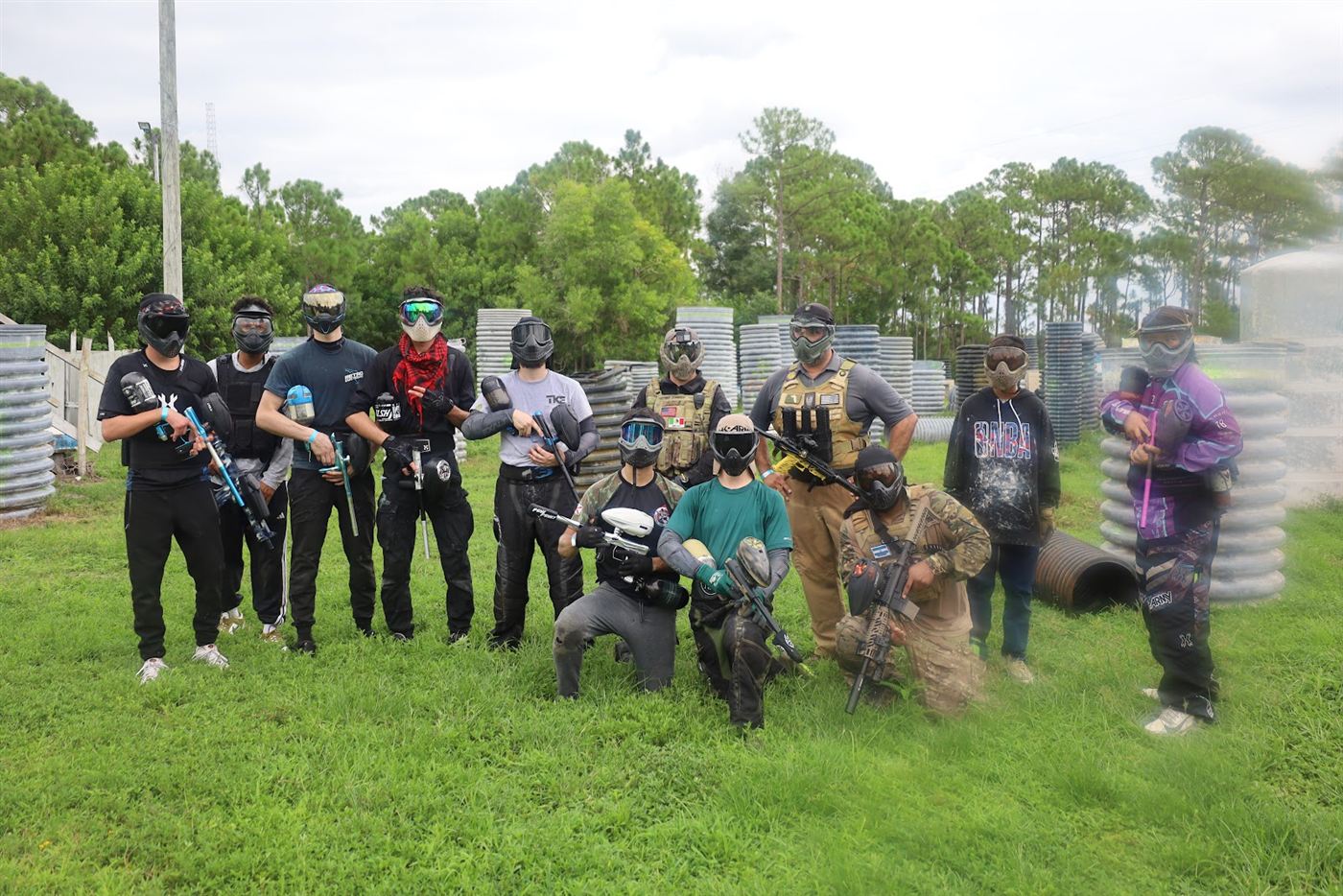 Group of players posing with their markers before a game